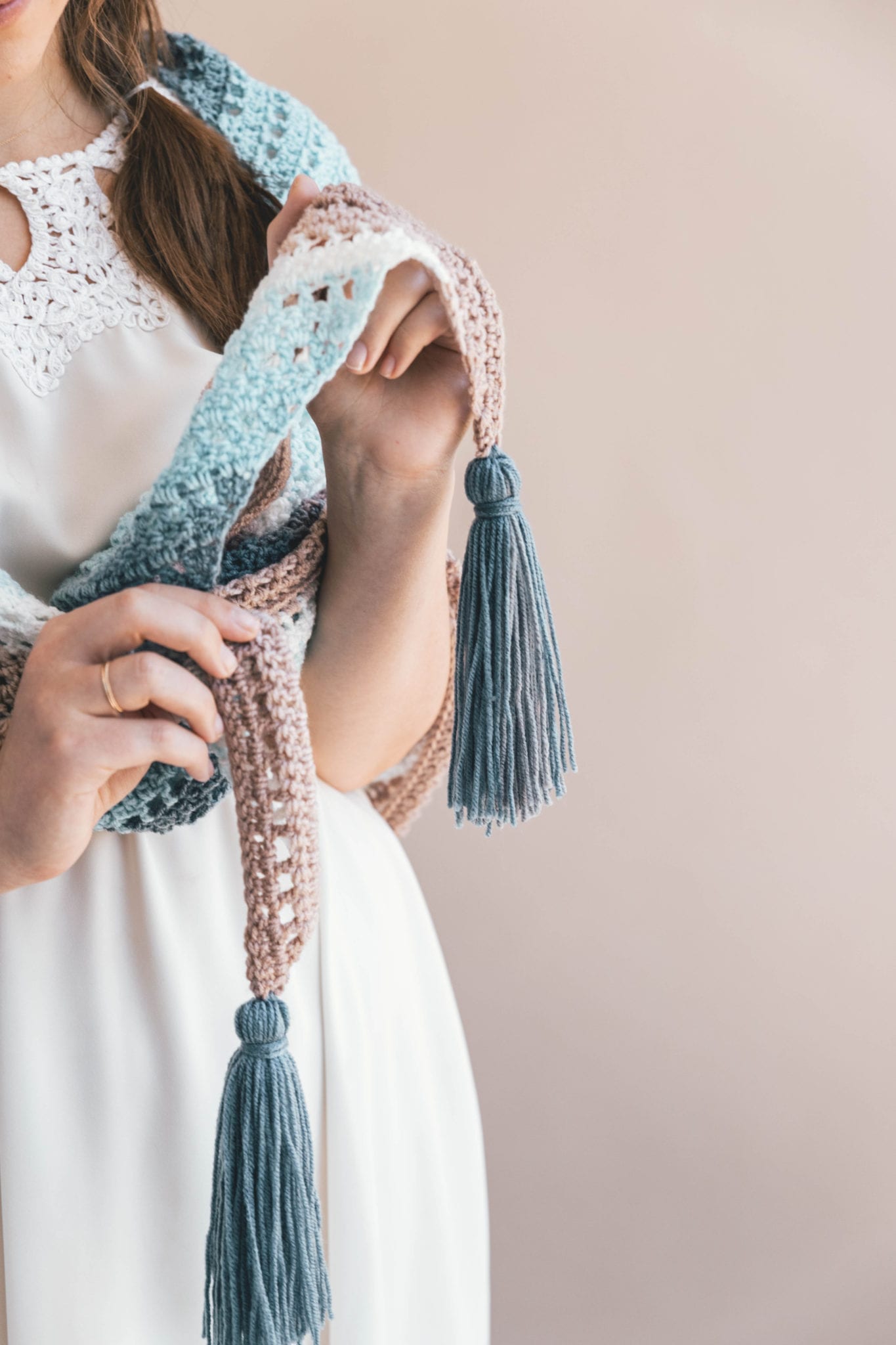 easy stitches and drapey tassels make for a effortless crochet wrap