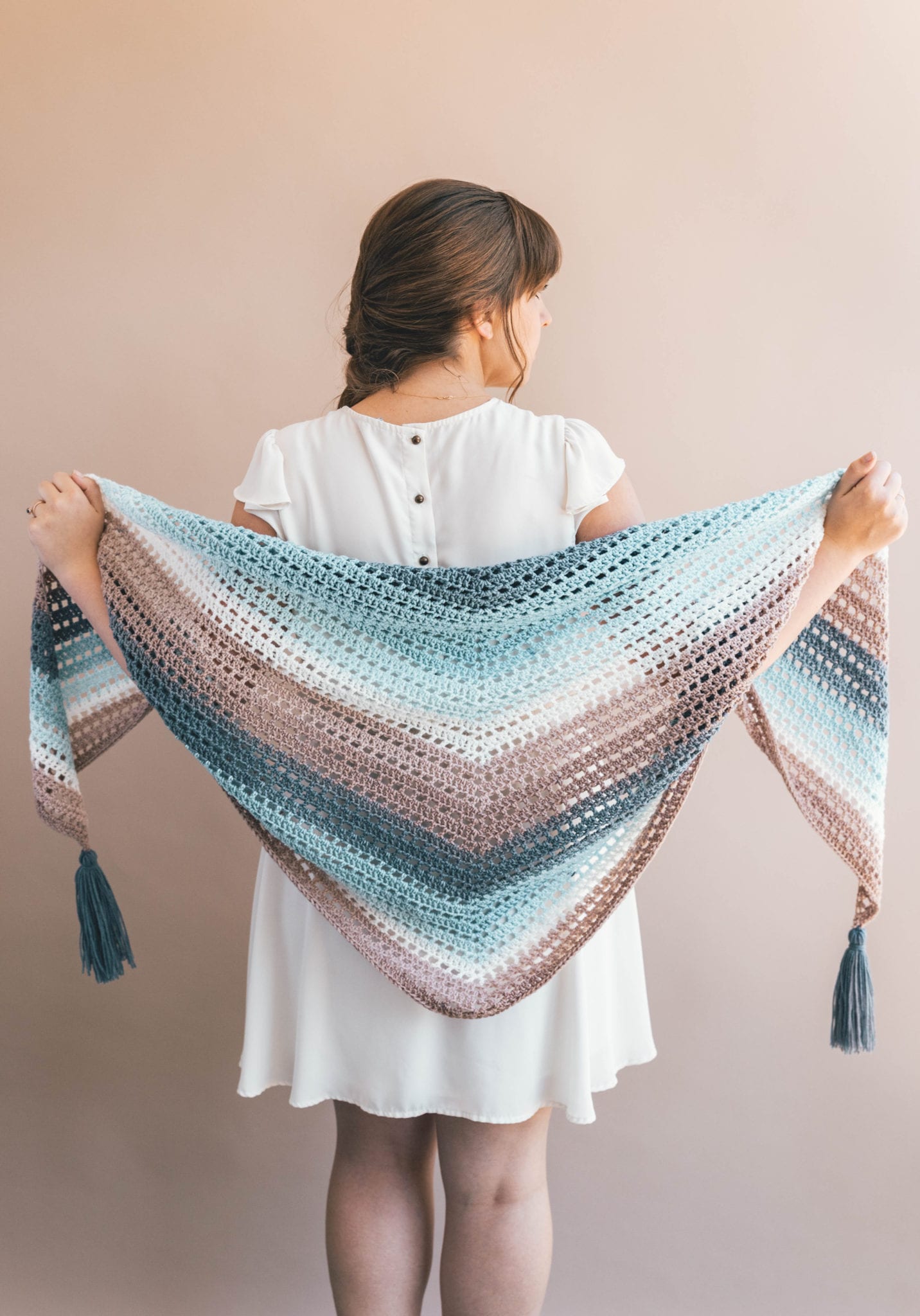 cake yarn creates a stunning faded effect in this crochet wrap shawl.