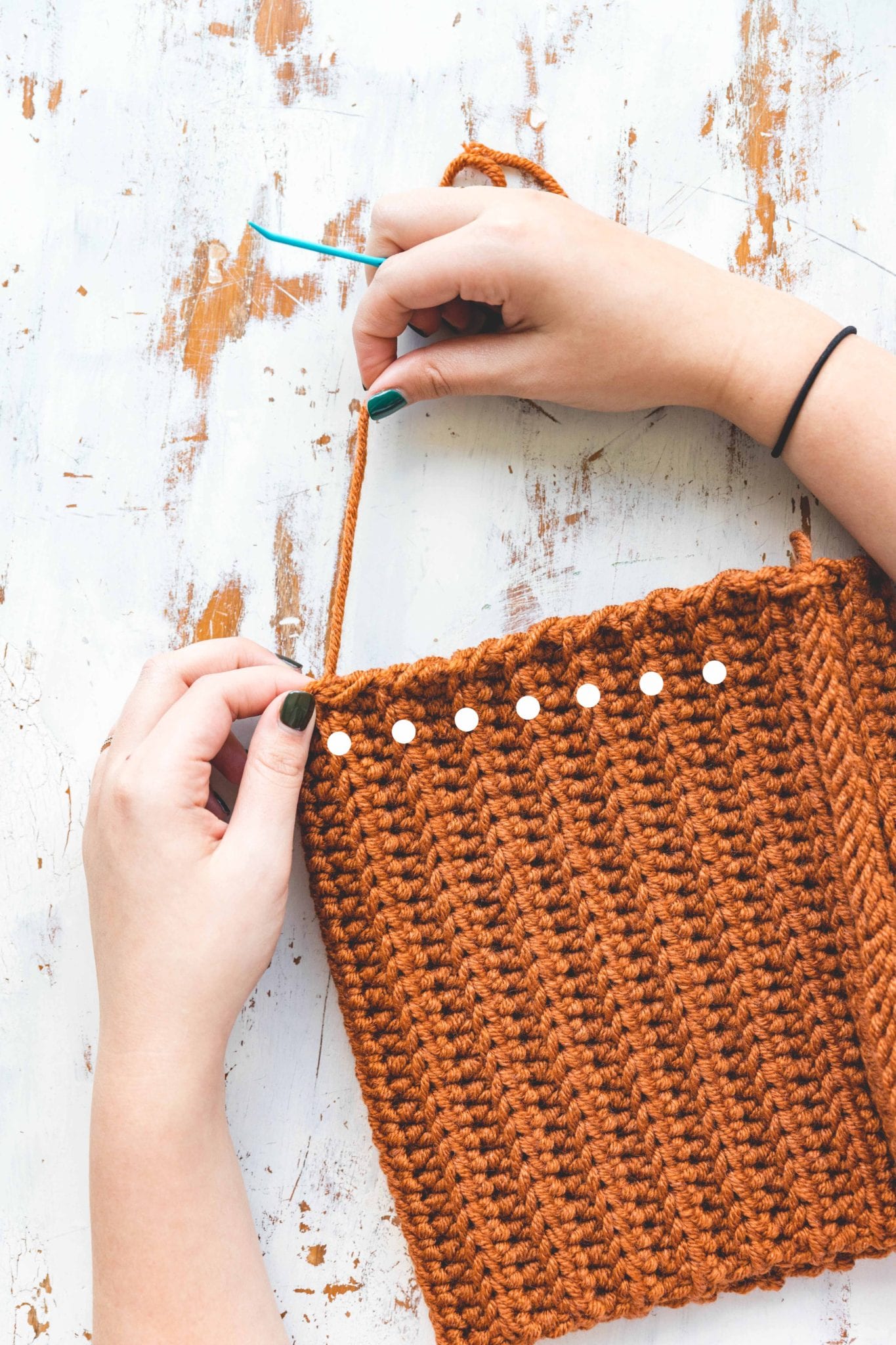 Know exactly where to stitch up the top of this easy crochet hat.