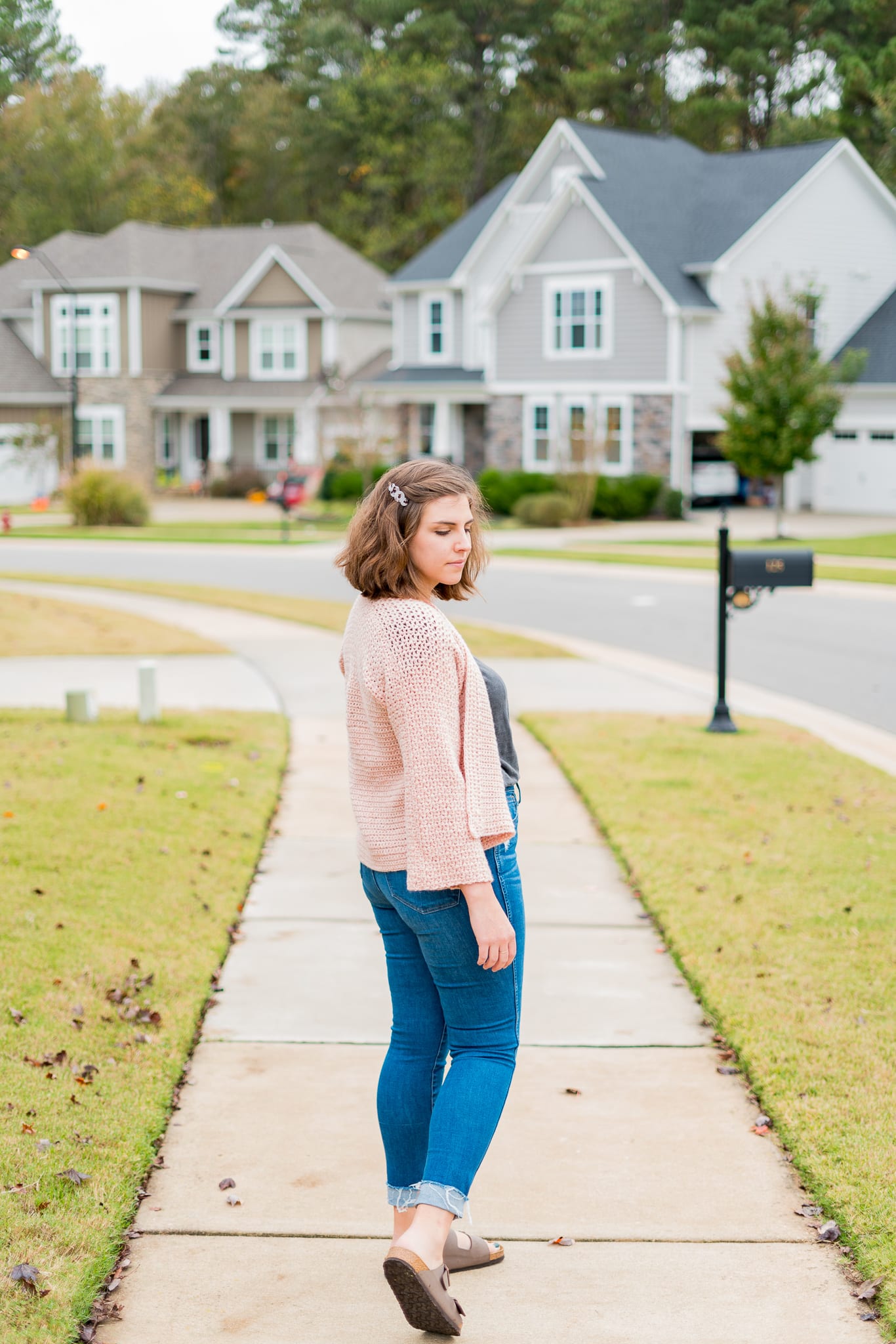 Easy crochet cardigan with simple construction and lace detail. Beginner friendly pattern.