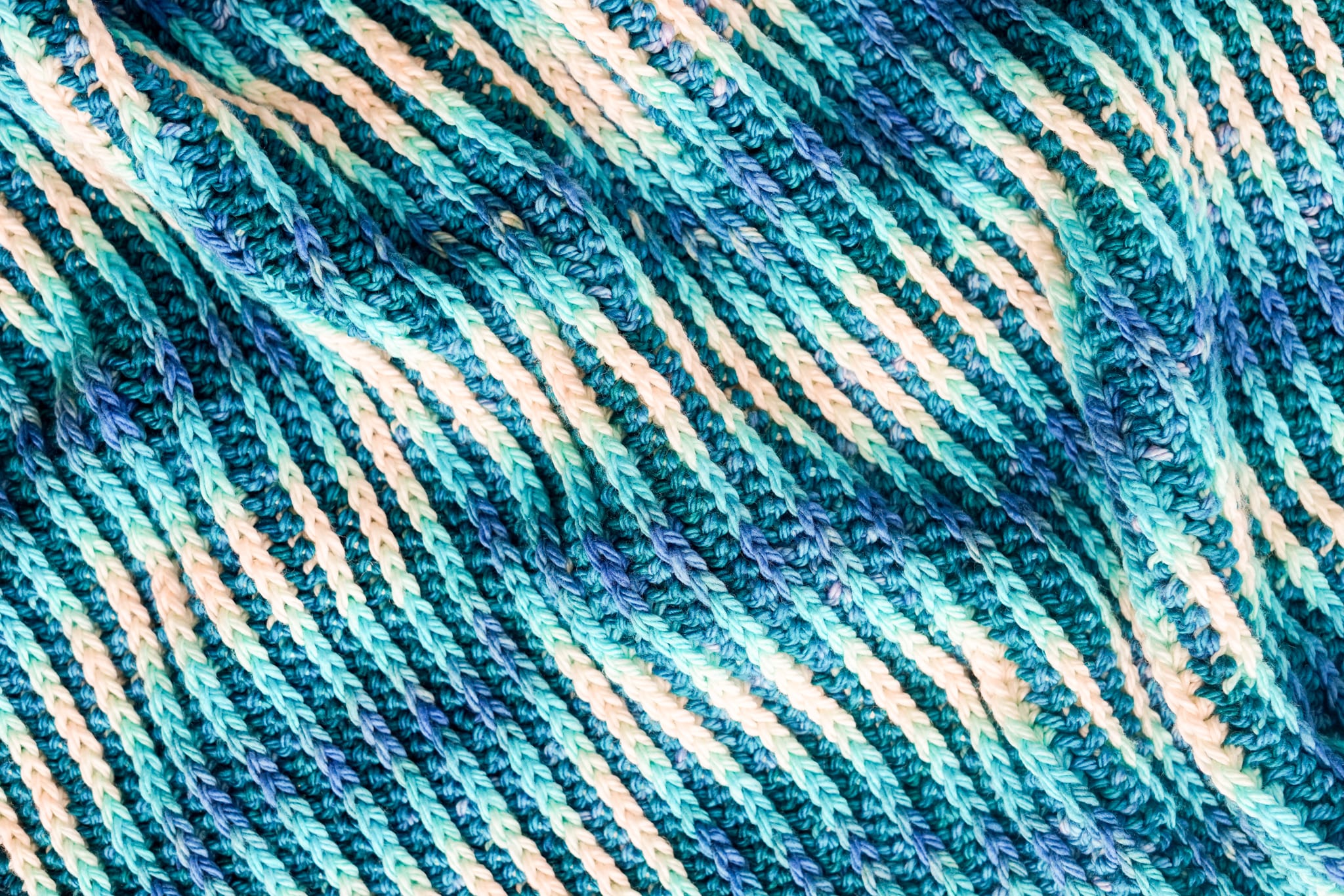 crochet blanket using hand dyed yarn and color pooling